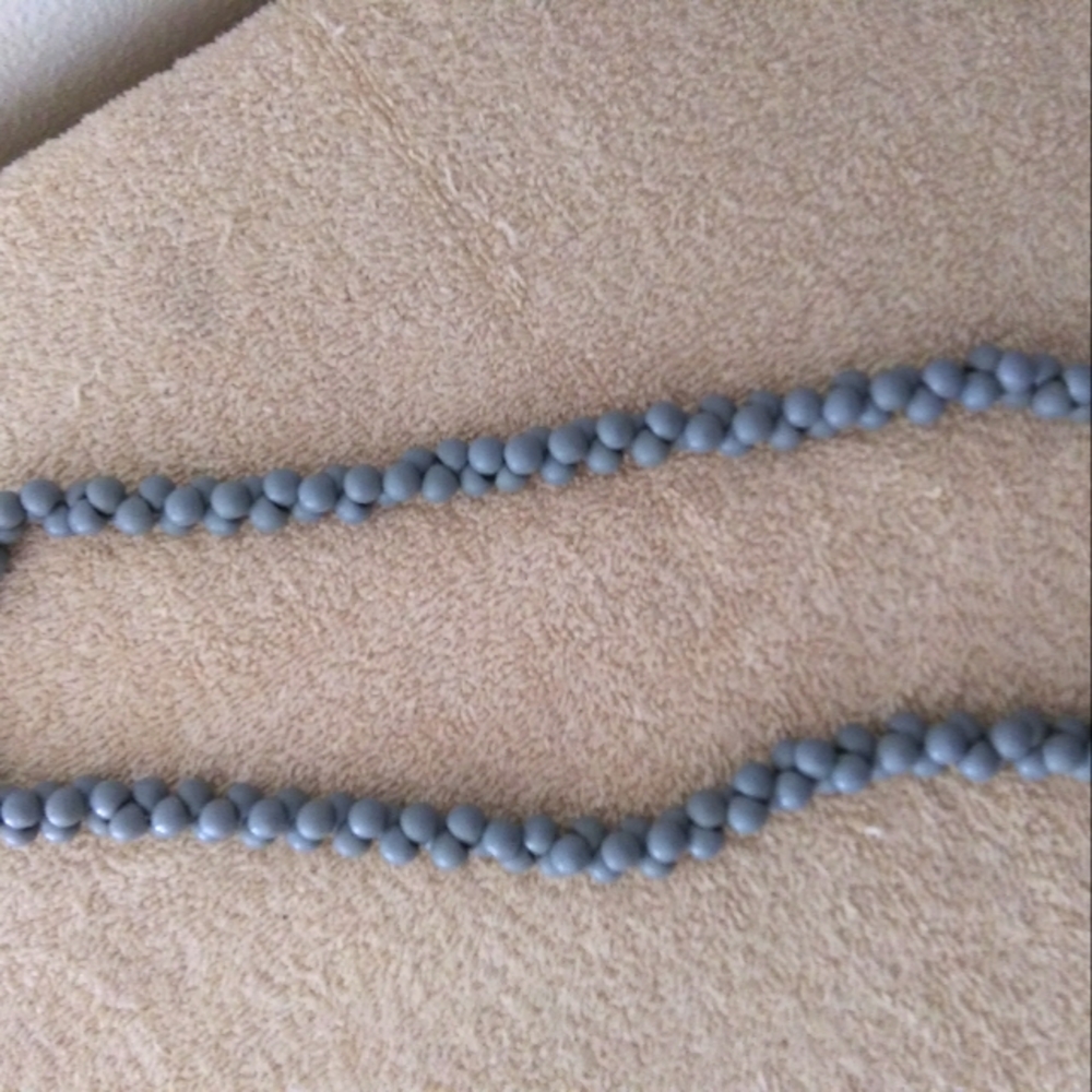 Gray 23 in necklace. Gray. Looks blue.